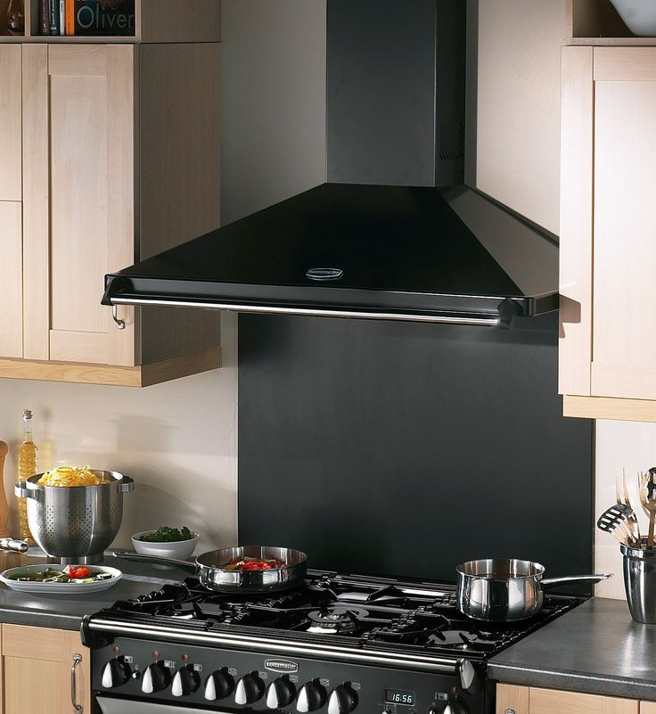 The chrome and black Classic Chimney Hood shows the versitility of the Rangemaster hood being compatible with traditional and more contemporary kitchens_